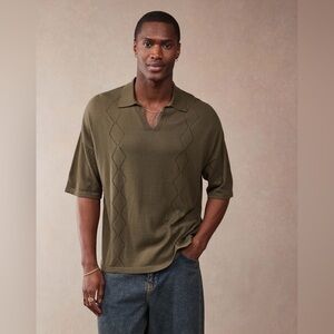 ASOS DESIGN relaxed knit notch neck polo shirt with pointelle pattern